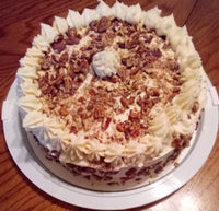 Red velvet layer cake with pecans